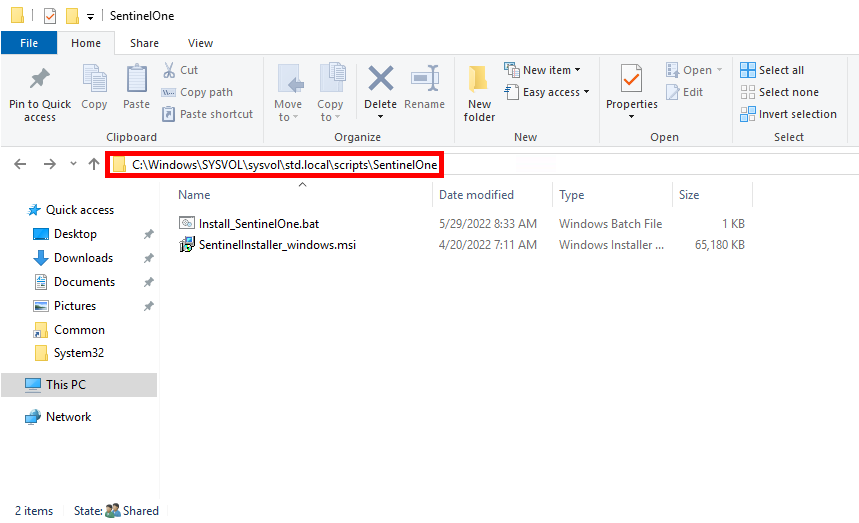 Dossier SYSVOL sur le serveur Active Directory montrant un script batch et le programme d'installation MSI de SentinelOne