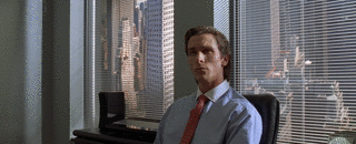 Christian Bale in American Psycho movie smiling