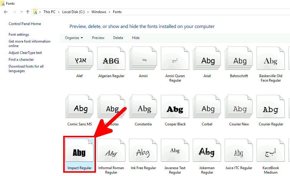 Windows Fonts folder with the Impact Regular font highlighted by a red arrow